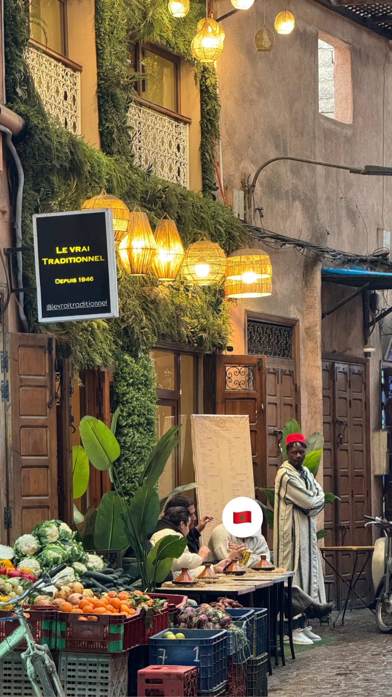 Friends gathered around couscous and pastilla, Marrakech medina restaurant since 1946