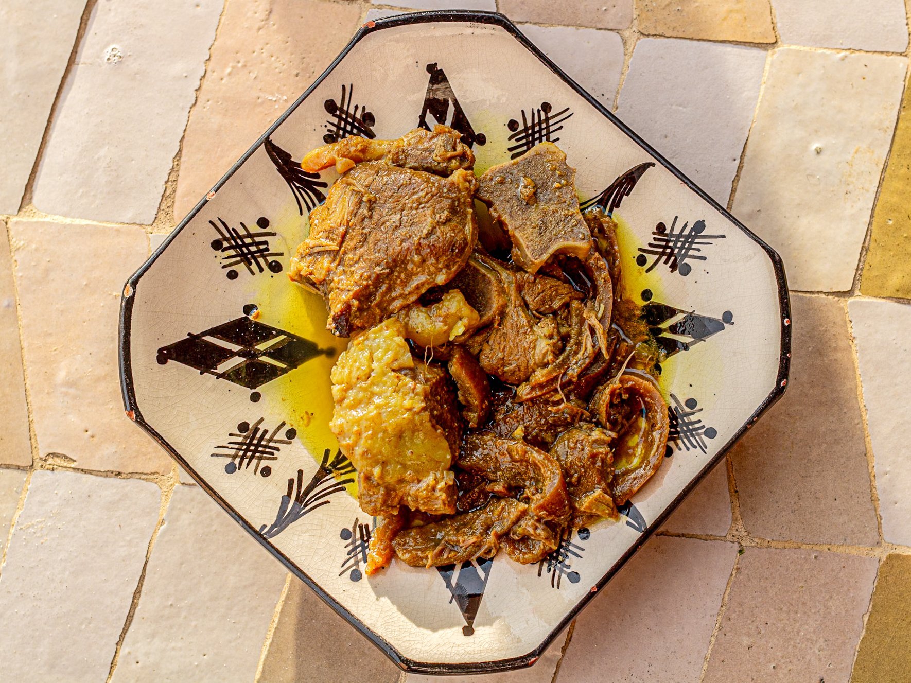 A hand-crafted Moroccan dish served on zellige tiles